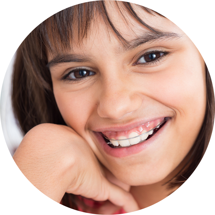 Young Smiling Girl Wearing Retainer