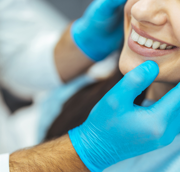 Close Up Of Smiling Woman During Orthodontic Examination