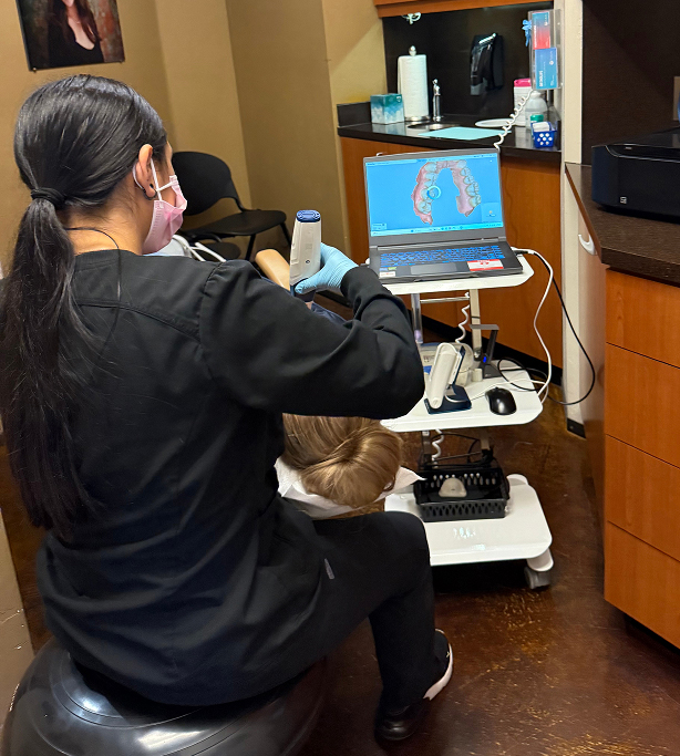 Mohr Orthodontics Staff Member Examining Patient